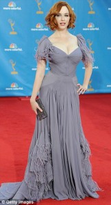 Christina Hendricks 162x300 Fuchsia Woman Rates the Emmy Awards Most Important Part: the Dresses